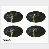 青と黒のトンボが緑と赤の草の上に 楕円形シール (シート)