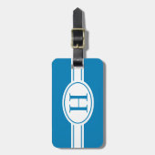 青にモノグラムを施したホワイトバンドと楕円形のシールド ラゲッジタグ (正面縦)