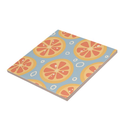 青の明るいはっきりしたとオレンジのスライスのパターン タイル (側面)