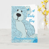 青の男の赤ちゃんのお祝いのテディー・ベア カード (黄色い花)