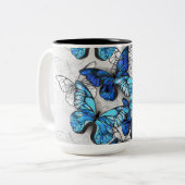 青白の蝶の構成 ツートーンマグカップ (正面左)