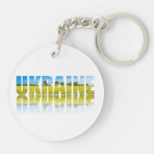 青空と黄色のフィールドを持つウクライナラベル キーホルダー (裏面)