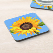 青空の太陽に対する黄色のひまわり – 夏 コースター (左側)