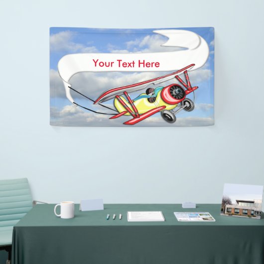 青空及び白い雲の複葉機の牽引の旗 横断幕 (トレードショー)