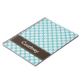 青緑の赤いデイジーの螺線形ノートジャーナル ノートブック (左側)