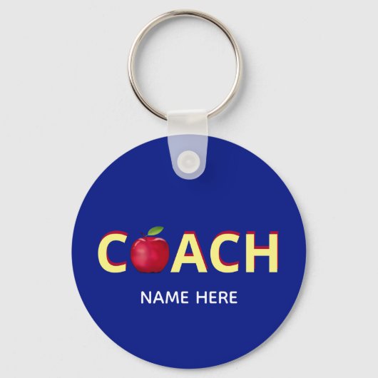青背景に赤い林檎のCoachテキスト キーホルダー (正面)