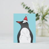 青背景のサンタ帽をかぶったかわいいジェンツーペンギン ポストカード (スタンド正面)