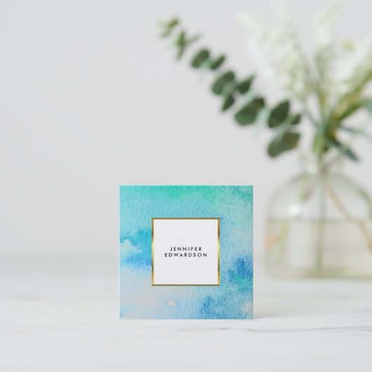 青色ティール（緑がかった色）水色（ばちゃばちゃ）跳ねるスプラッシュ金ゴールド エレガント スクエア名刺 (スタンド正面)