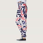 青芸術的とオレンジのアクリル曲線パターン レギンス (左)