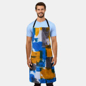 青、オレンジ、グレーの抽象芸術アート エプロン (着用した状態)