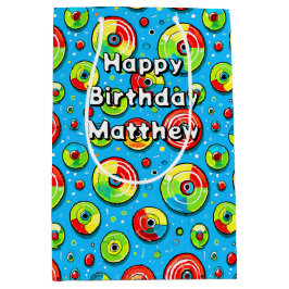 青、緑、赤ディスクゴルフをテーマにした誕生日 ミディアムペーパーバッグ