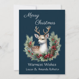 静かな鹿、ホーリーの花輪を纏い、濃い青を背景に シーズンカード
