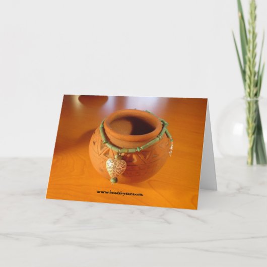 静止しているサラ著ビーズ ノートカード (正面)