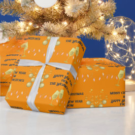 非常メリーに濃いオレンジ色のクリスマス ラッピングペーパー