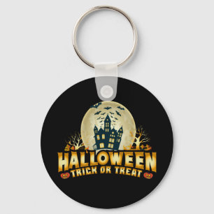 面白いハロウィーントリックまたは恐ろしいキーチェーンを扱う キーホルダー