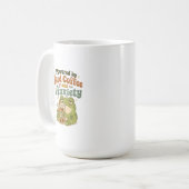 面白いレトロカエル アイスコーヒーと不安に支えられる コーヒーマグカップ (正面左)
