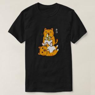 面白い猫がバナナを食べる ネコ かわいいキャラクター オレンジ Tシャツ