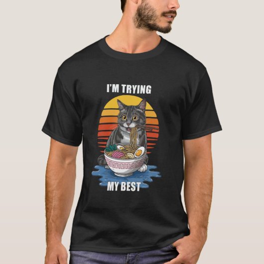 面白い猫のミーム 一生懸命頑張ってる Tシャツ (正面)