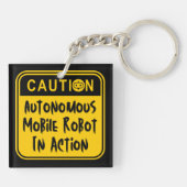 面白い自律移動ロボットが動いている キーホルダー (裏面)