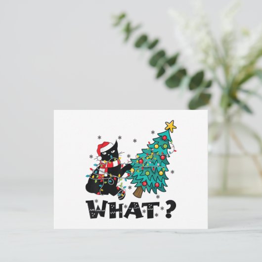 面白い黒猫のサンタがクリスマスツリーを押している シーズンカード (スタンド正面)