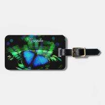 革バンドが付いている青い蝶荷物のラベル