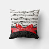 音楽ノートおよびフェイクで赤いリボン クッション (裏面)