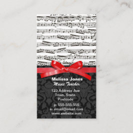 音楽ノートおよびフェイクで赤いリボン 名刺