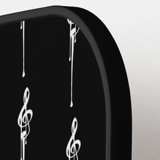 音楽モチーフ溶ける高音クレフ、 音符記号白と黒 ピックルボールラケット (左詳細)