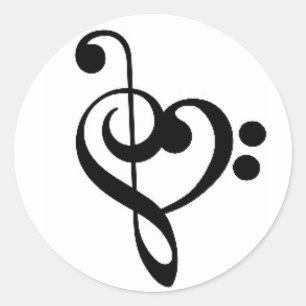 音楽的なハート: 編まれた三重およびヘ音記号 ラウンドシール