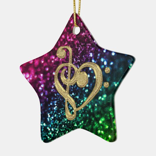 音楽記号を用いる光っている着色された星 セラミックオーナメント (左)