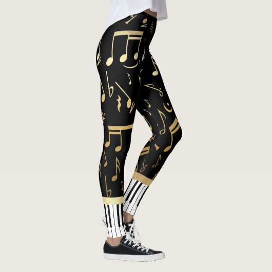 音符およびピアノ鍵の黒および金ゴールド レギンス (右)