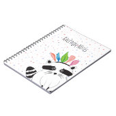 頭に羽根をつけたユーモアたっぷりのラッコ ノートブック (左側)