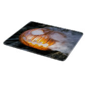 頭のない馬乗りのジャック・オ・ランタンが炎の頭を上げる カッティングボード (角)