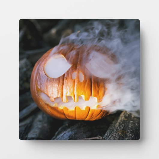 頭のない馬乗りのジャック・オ・ランタンが炎の頭を上げる フォトプラーク (正面)