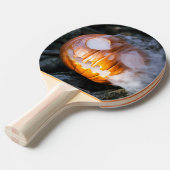 頭のない馬乗りのジャック・オ・ランタンが炎の頭を上げる 卓球ラケット (正面アングル)