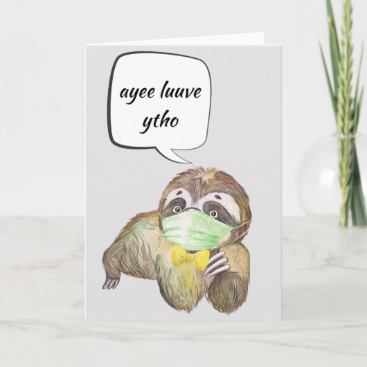 顔にマスクをつけたスローガンが愛を語る カード (正面)