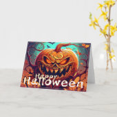 顔のある怖いオレンジのカボチャ、ハロウィン カード (黄色い花)