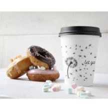 風に流れるタンポポの種