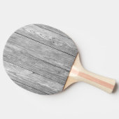 風化した濃い灰色の木製 卓球ラケット (横)