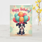 風船を持った犬の誕生日カード カード (黄色い花)