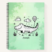 風船を持つ幸せなワニ - かわいいベビーアート ノートブック (正面)