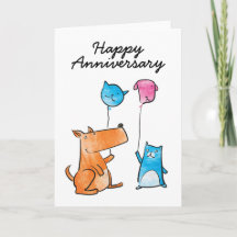 風船記念日カードを持つ犬と猫