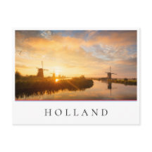 風車とオランダの川の日の出