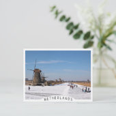 風車に沿ったスケートで滑る氷は冬になると ポストカード (スタンド正面)