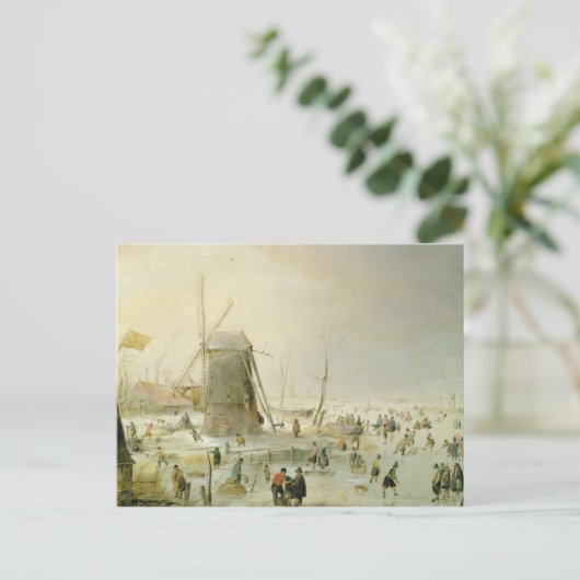 風車のそばのスケーターのいる冬の風景 ポストカード (スタンド正面)