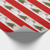 飛んでいるなブタは完全なクリスマスツリーを家に持って来ます ラッピングペーパー (角)