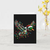飛んでいるサンタダッククリスマスライト狩りSe カード (黄色い花)