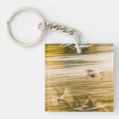 飛んでいる貝 – 抽象芸術 キーホルダー (正面)