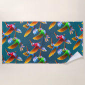 飛カラフル行中のハミングバード ビーチタオル (正面)