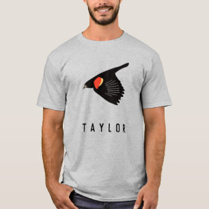 飛パーソナライズされた行中の赤翼の黒鳥 Tシャツ